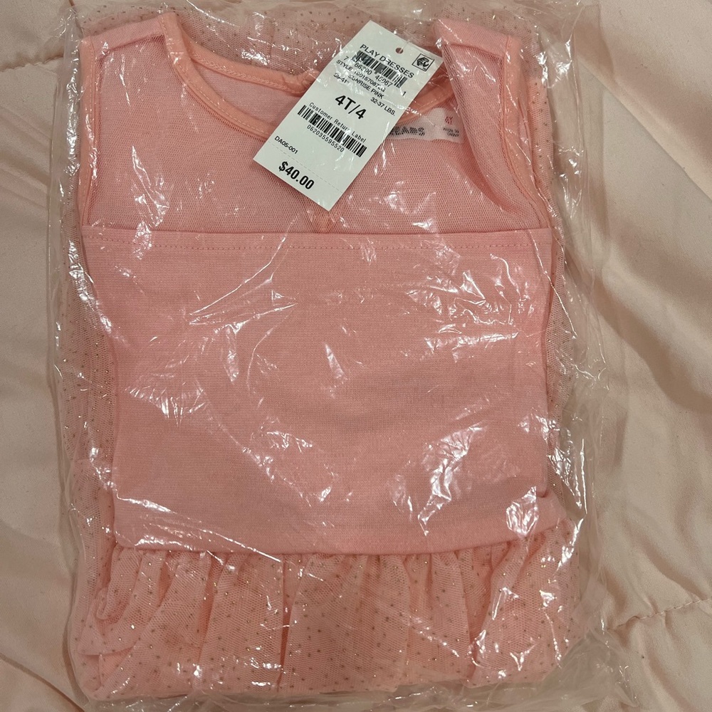 I have two brand new Pink Epic Threads dresses. They’re toddler sizes.